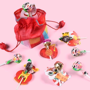 Chinesische Neujahr-Glückstüte mit süßen Lutscher-Karten und traditionellen Elementen