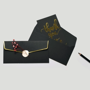 Elegant black and gold thank you card set with wax seal and dried flower decoration