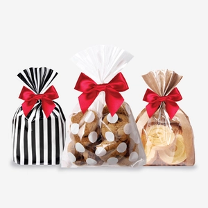 Polyester ribbon bows with twist ties on striped and kraft gift bags for cookies