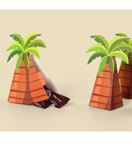 Detail of 3D palm tree gift boxes showing paper leaves and chocolate inside