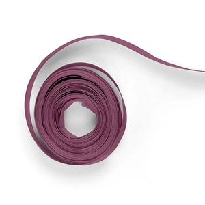 Single roll of plum purple polyester ribbon for gift wrapping on a white background