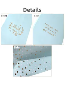 Detailed view of blue business gift bag with gold thank you text and polka dot sides