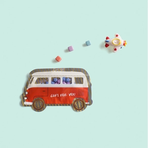Red bus-shaped self-sealing candy bags with clear window and Gift For You text