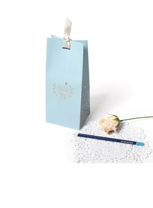 Blue paper gift bag with golden Thank You wreath and white silk ribbon detail