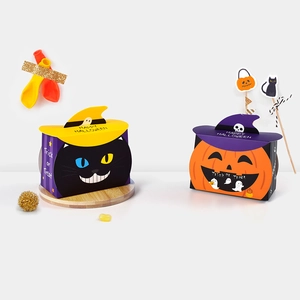 Halloween gift boxes featuring pumpkin and black cat designs with festive wizard hats