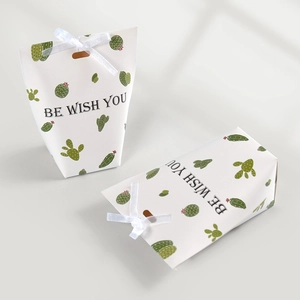 Off-white gift bags with green cactus patterns and elegant white silk bow decorations
