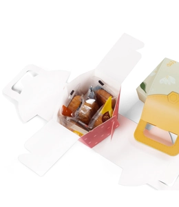 Foldable gift box for pastries with pink polka dots and floral patterns and handle