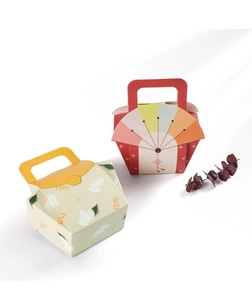 Detail of floral and traditional gift boxes with unique folding handle design
