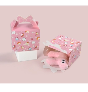 Pink cartoon gift box with hollow bow handle showing interior storage space and cute patterns