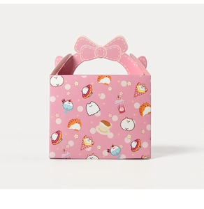 Detailed view of pink gift box with cartoon prints and bow-shaped handle cutout