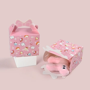 Pink cartoon gift boxes with cute illustrations and matching plush toy accessory