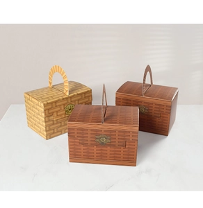 Macro detail of paper gift boxes with faux bamboo texture and vintage latch design