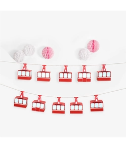 Detail of red cable car paper gift boxes with decorative honeycomb balls for party decor