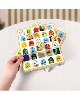 Detail of 30-day Ramadan advent calendar box with printed mosque and crescent patterns