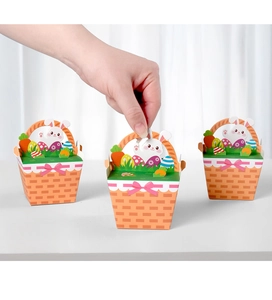 Detailed view of three Easter gift baskets with rabbit and egg decorations in use