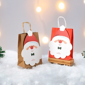 Christmas party paper gift bags featuring Santa Claus and elk designs for holiday candy treats