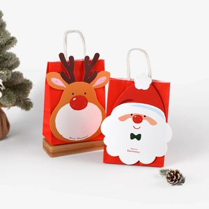 Christmas gift bags with Santa and Reindeer designs for holiday party favors and candy packaging