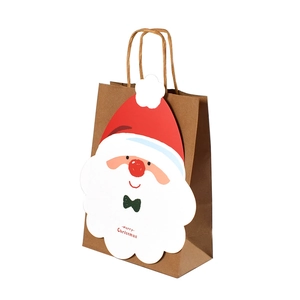 Brown kraft paper Christmas gift bag featuring a 3D Santa Claus and Merry Christmas text