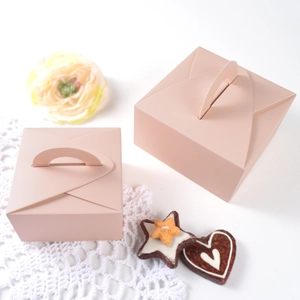 Scatole regalo rosa pieghevoli con manici per matrimoni e confezioni di dolci