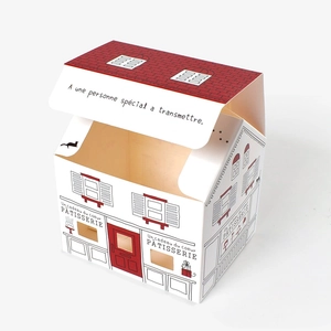 Japanese minimalist house-shaped gift box with red roof and pastry shop illustrations