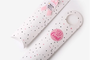 Polka dot long gift box with pink ribbon and You Are Loved sticker detail