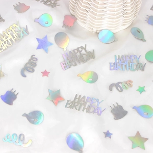 Holographic happy birthday confetti set with silver stars and cake shapes for party decor