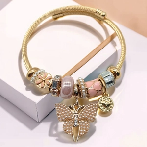 Golden cable open bangle with butterfly pendant, pink charms and pearl beads for women