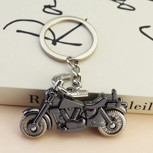 Detailed vintage metal motorcycle keychain with polished gunmetal finish for men