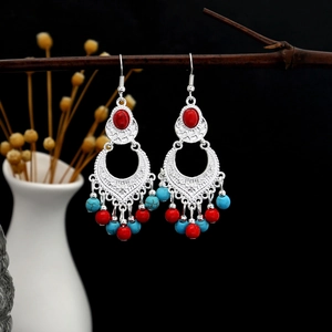 Bohemian silver drop earrings with red stone and turquoise bead tassels on branch