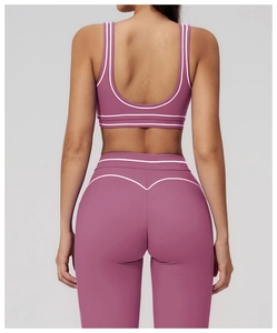 Close-up of high-waist yoga leggings with V-shaped stitching for a lifting effect