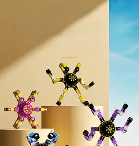 Mechanical fingertip spinners with transformable arms in various colors on geometric stands