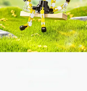 Mechanical fidget spinner with glowing parts and yellow articulated arms in outdoor play setting