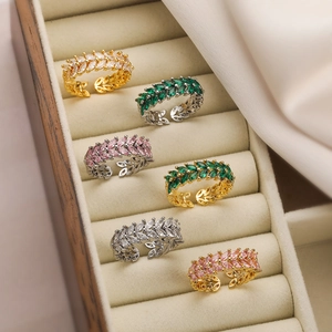 Detail of wheat ear rings with marquise zircons in gold and silver plating