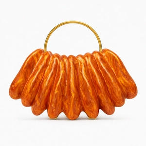 Chic amber wave acrylic evening clutch bag with round gold metal handle