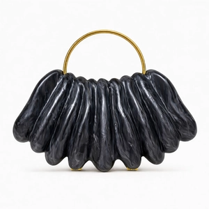 Artistic wave acrylic evening clutch bag featuring black marble texture and gold metal ring handle