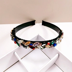 Detail of crystal headband showing multi-colored rhinestones and anti-slip teeth grip