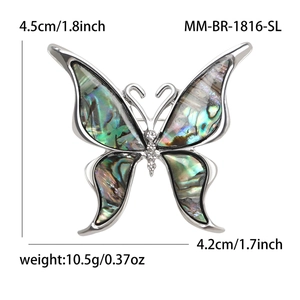 Elegant silver butterfly brooch with natural abalone shell wings and sparkling crystals