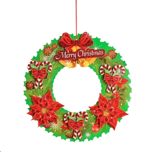 Festive Christmas wreath hanging decoration with Merry Christmas text and red bow