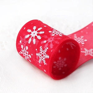 Red Christmas snowflake sheer ribbon for gift wrapping and festive holiday decorations