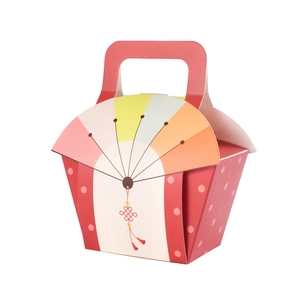 Red fan-shaped gift box with pink polka dots and traditional Chinese knot pattern