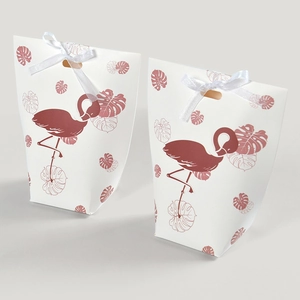 Detail showing two white paper gift bags with red flamingo prints and white satin bows