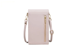 Detail showing the back of pink PU leather phone bag with a vertical gold metal zipper