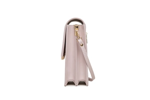 Detail view of pink lavender crossbody bag featuring a multi-layer accordion design