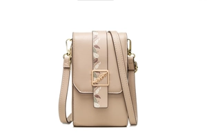 Detail of beige PU leather crossbody phone bag with gold feather clasp and leaf print