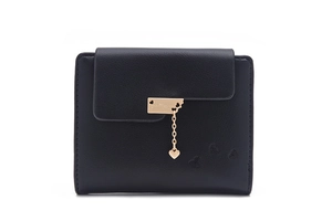 Detail of black leather wallet featuring golden Just for you plate and heart pendant