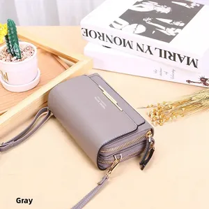 Gray lychee grain faux leather crossbody phone bag with double zipper and adjustable strap