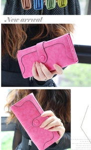 Detailed close-up of pink frosted long wallet with white stitching and snap closure