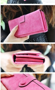 Close-up of rose red matte leather wallet with card slots and durable double stitching