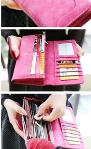 Detail of pink matte long wallet featuring ten card slots and multiple compartments