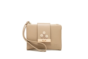 Detailed close-up of beige PU leather wallet featuring daisy prints and gold metal buckle